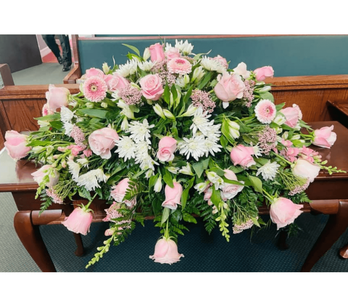 Pink and white casket spray