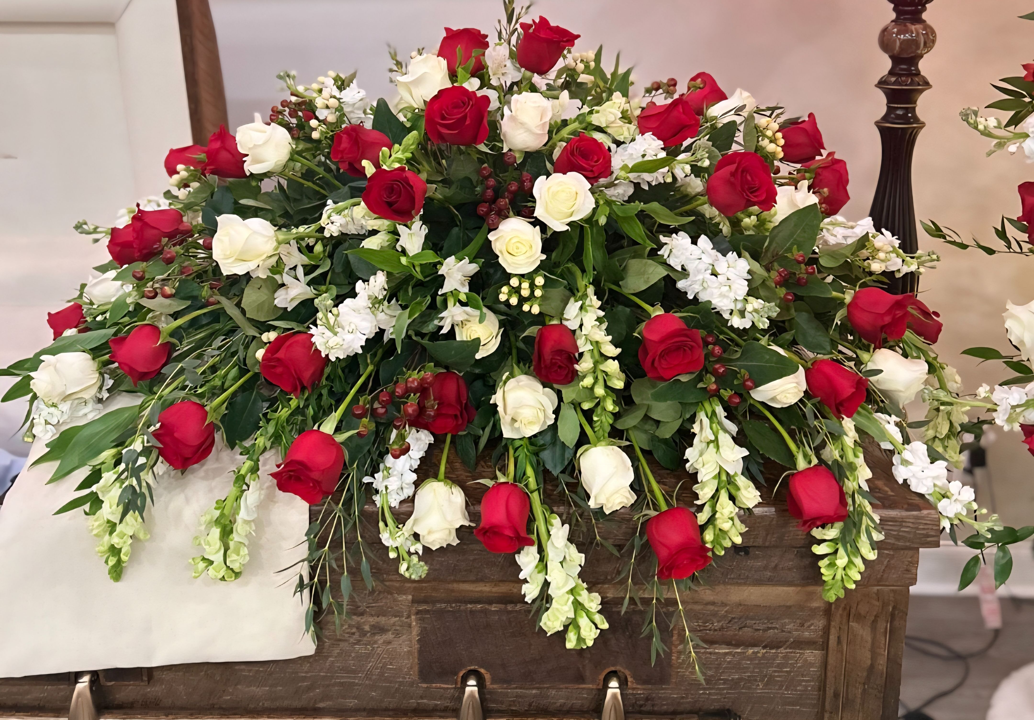 Red and white casket spray Red and white casket spray